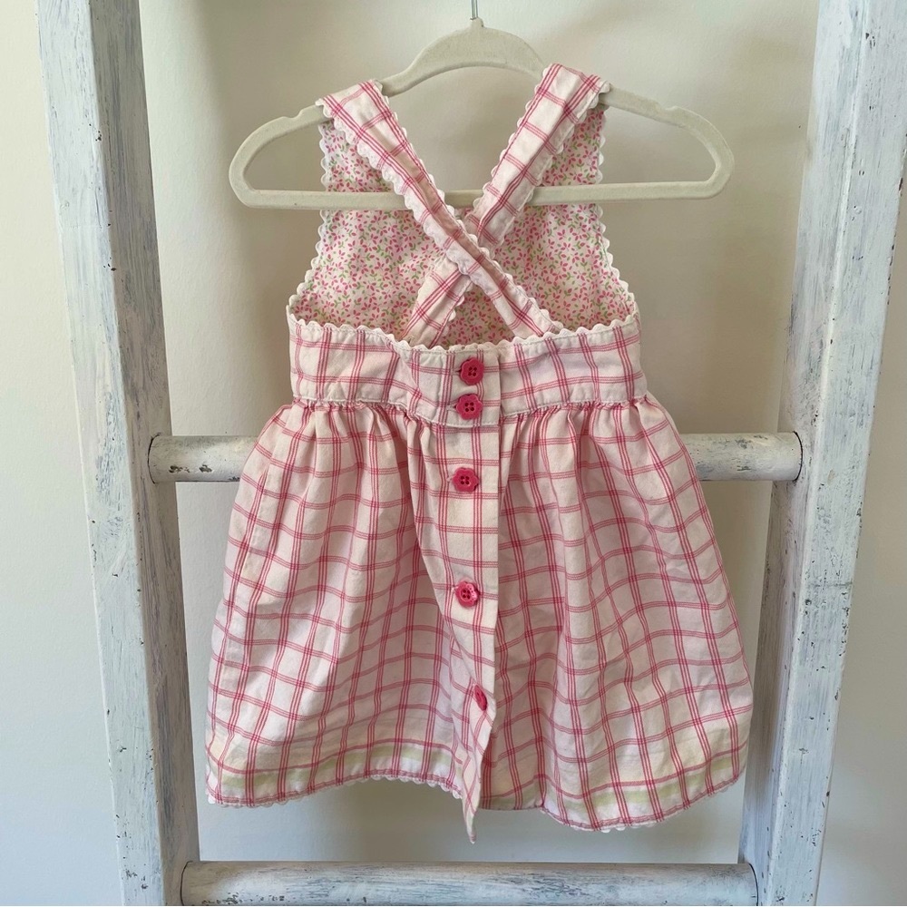 Apron style baby dress
